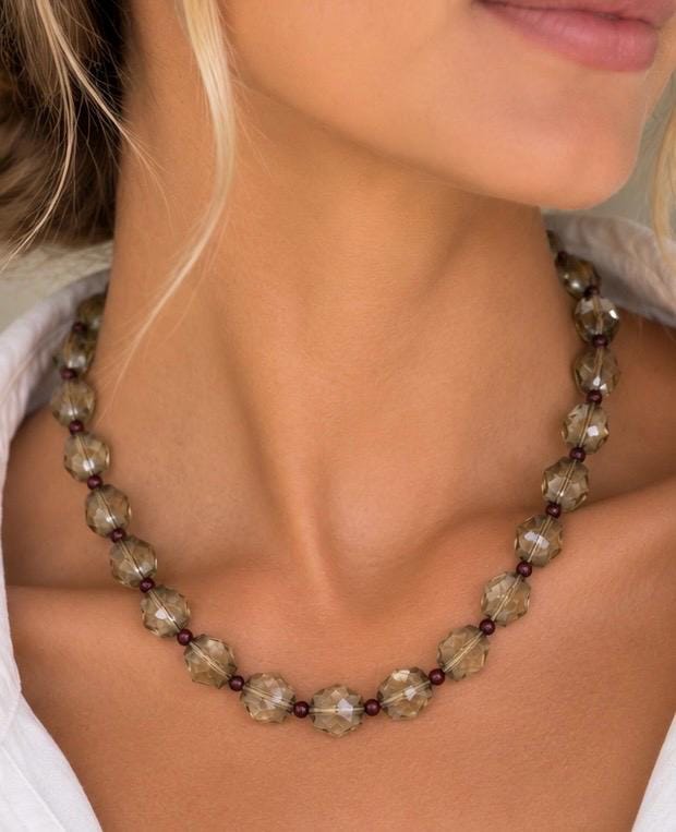 Quartz necklace worn at the neckline
